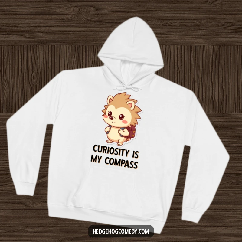 Funny, cozy hoodie depicting a curious hedgehog with a backpack, symbolizing curiosity and readiness for adventure.