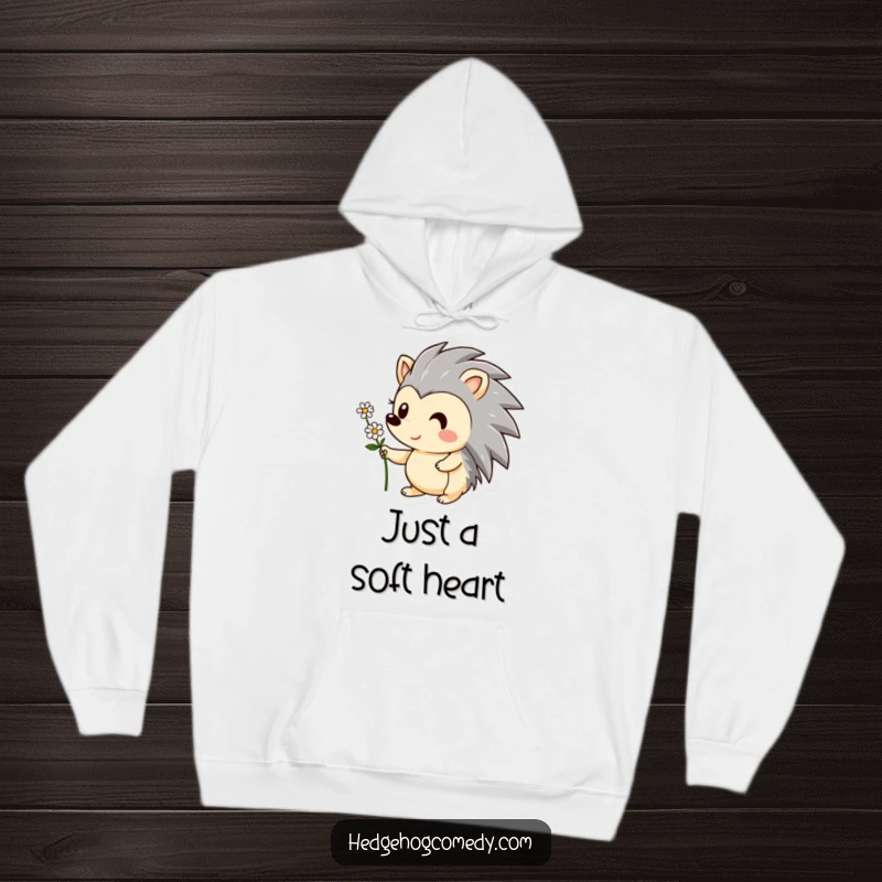 Funny hoodie featuring a delightful hedgehog character smiling and offering a small flower, symbolizing kindness. Cozy and cute gift.