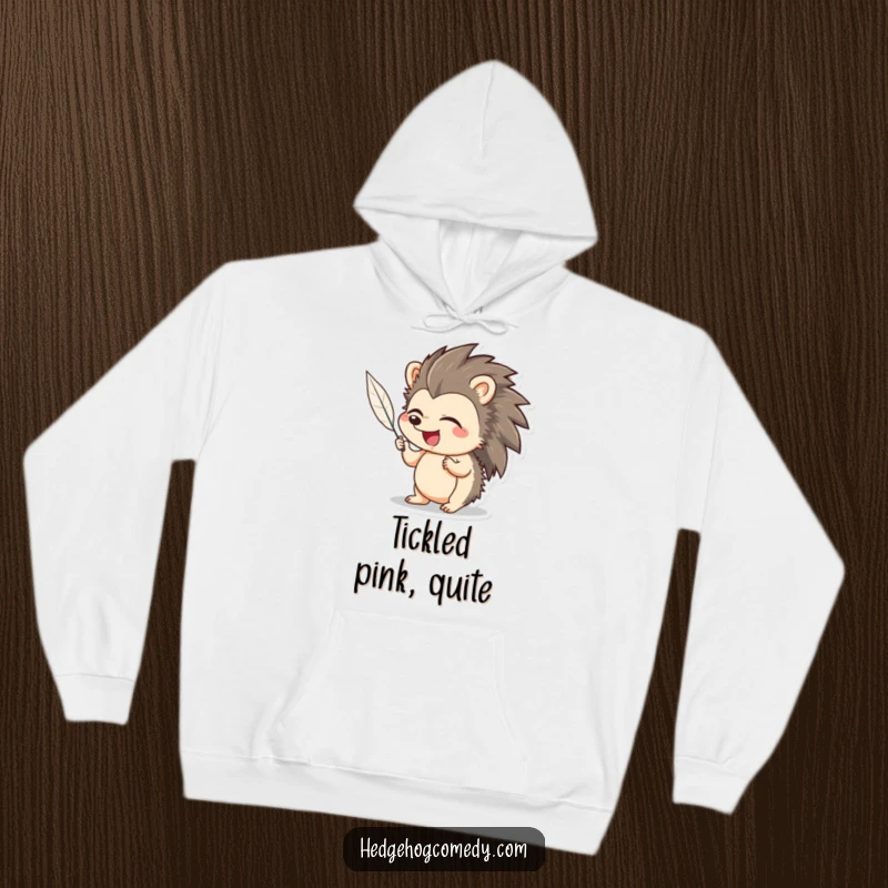Funny Hedgehog Hoodie: Adorable hedgehog giggling hysterically while a feather tickles it, perfect for cozy, humorous wear.