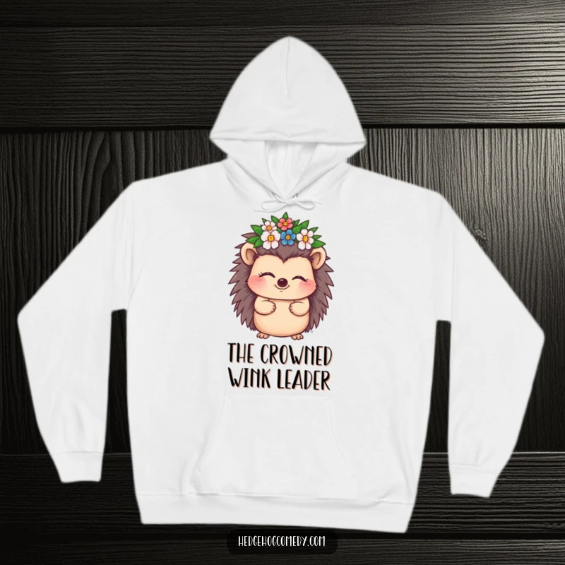 Funny Hedgehog Hoodie featuring an adorable hedgehog character winking charmingly while wearing a tiny crown made of flowers.