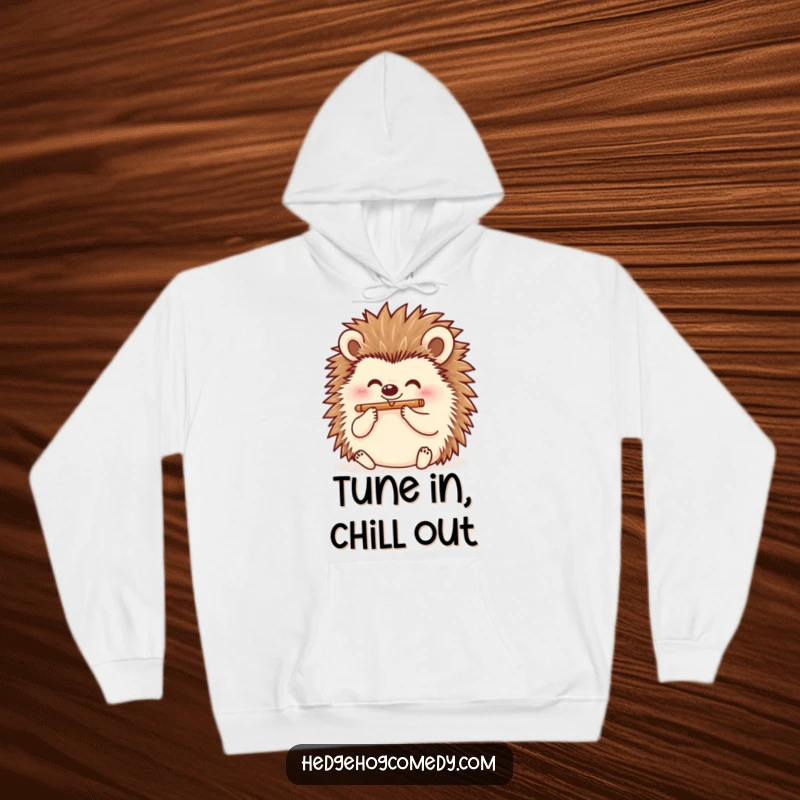 Funny hedgehog player of a tiny flute, radiating happiness on a hoodie, a perfect funny gift.