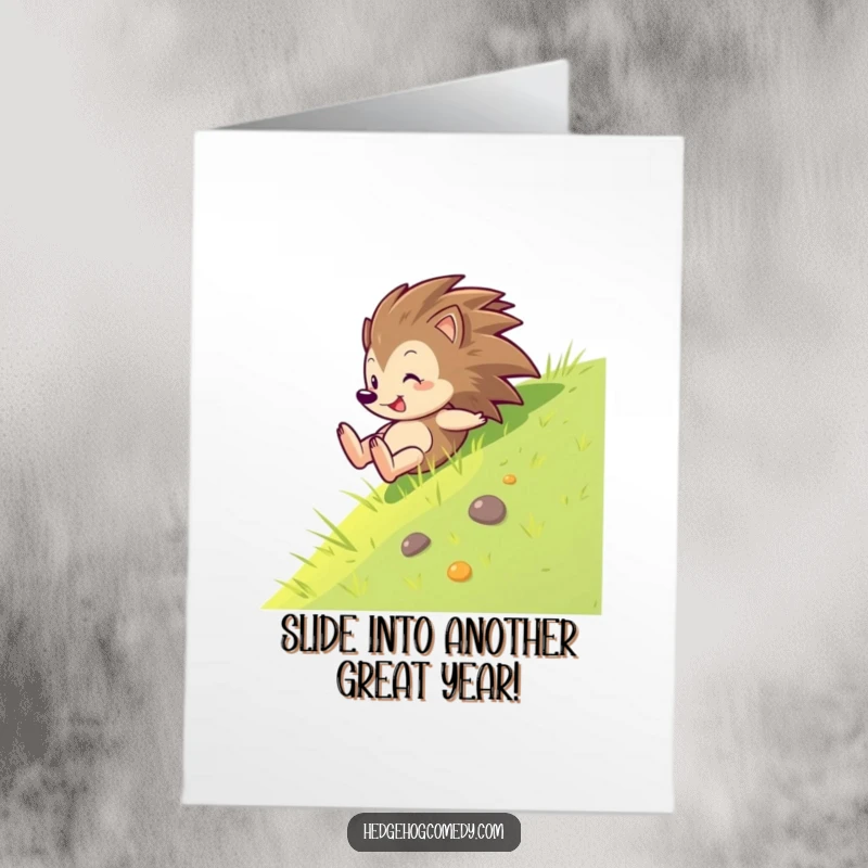 Funny Free Printable Birthday Card: A hedgehog slides down a grassy slope with pure glee, embodying birthday fun and downloadable humor.