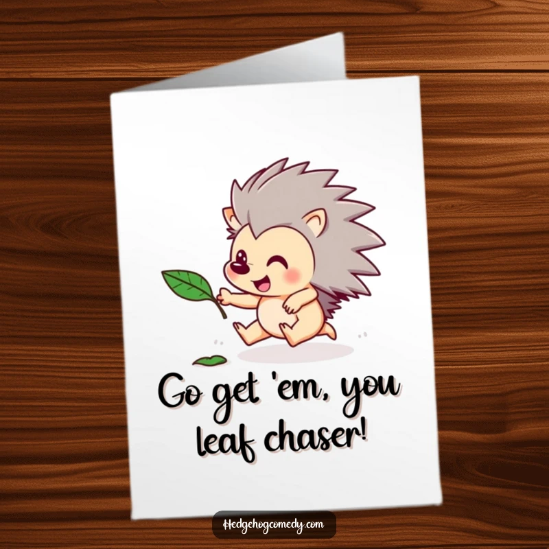 Funny Free Printable Congratulations Card showing an energetic hedgehog in pursuit of a floating leaf, symbolizing uplifting fun.