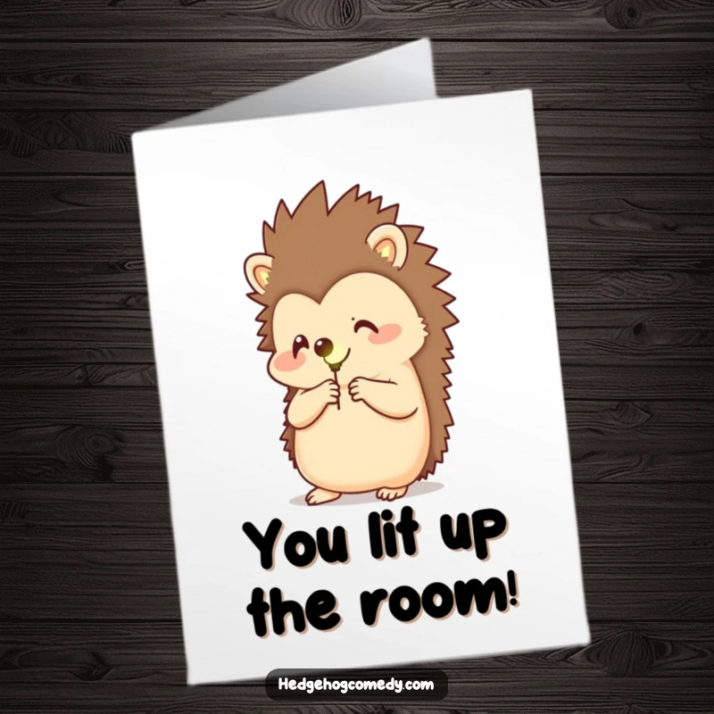 Funny Free Printable Congratulations Card: A hedgehog joyfully holds a bright firefly, symbolizing glowing achievements and downloadable congratulations.