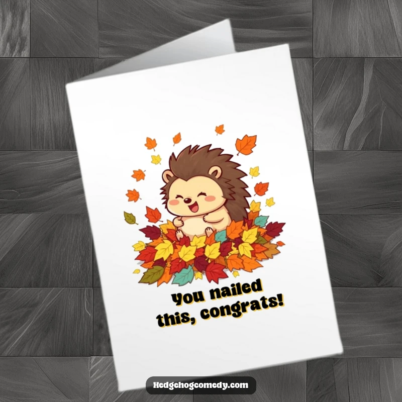 Funny Free Printable Congrats Card: Happy hedgehog excitedly rolling in a pile of colorful autumn leaves, pure bliss.