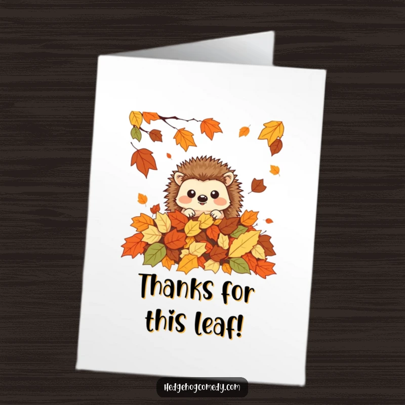 Funny Free Printable Thank You Card: A cute kawaii hedgehog hiding amongst autumn leaves, conveying thanks.