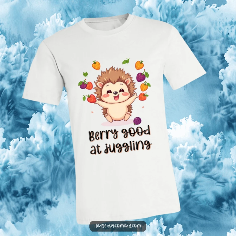 Funny Hedgehog T-Shirt depicting a small hedgehog character excitedly juggling a colorful assortment of berries, full of joy.