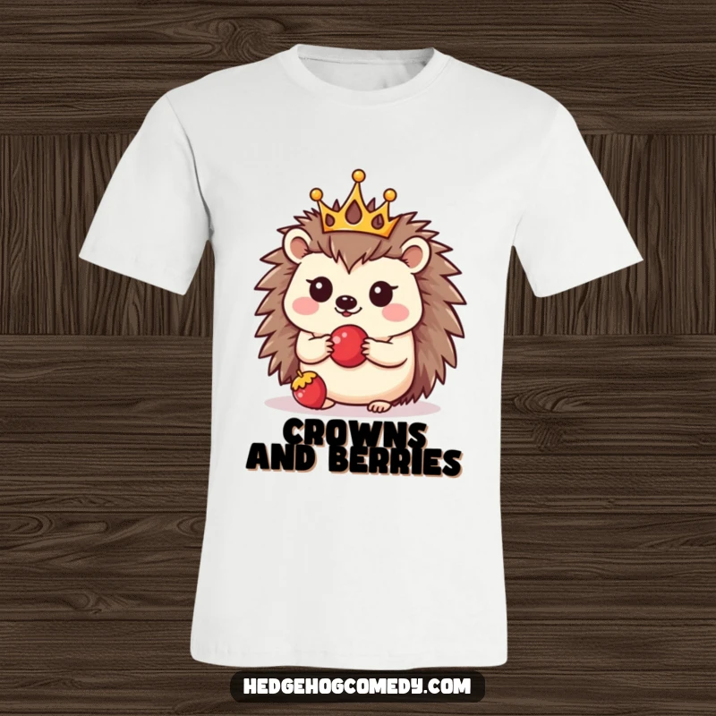 Funny t-shirt showcasing a kawaii hedgehog with a tiny crown, precariously balancing a berry, radiating pure cuteness and humor.