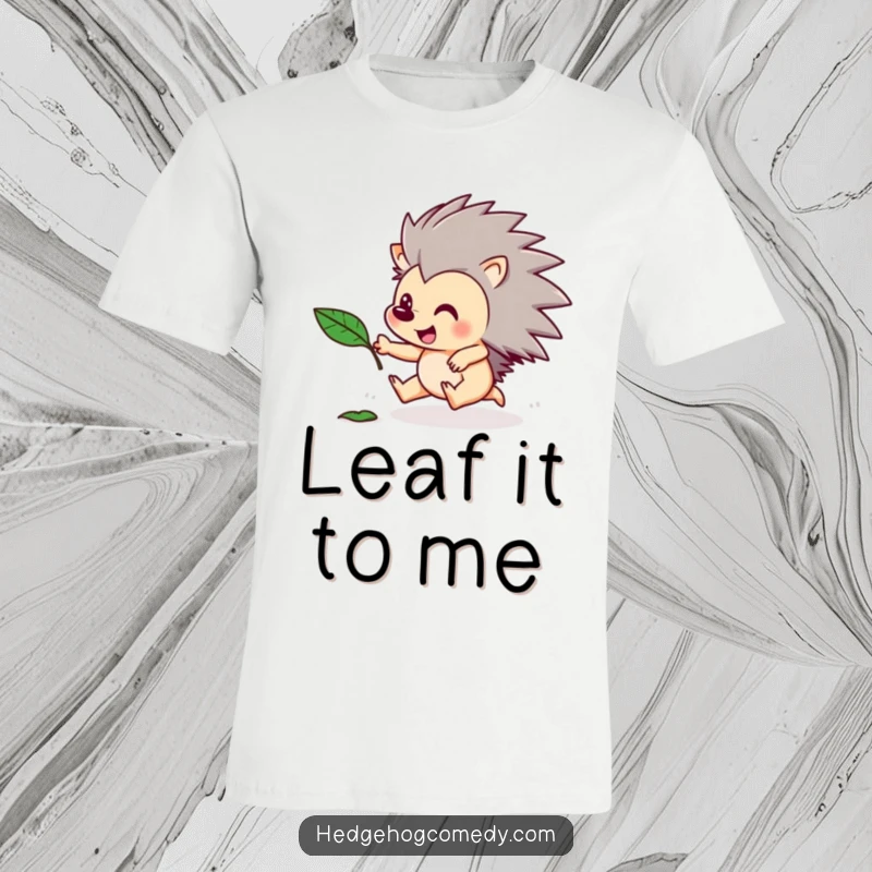 Funny t-shirt design of an excited hedgehog character running after a floating leaf. Playful and humorous autumn-themed apparel.