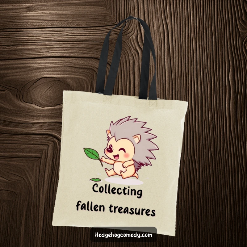Funny tote bag with a hedgehog character excitedly pursuing a floating leaf. Playful and humorous accessory.